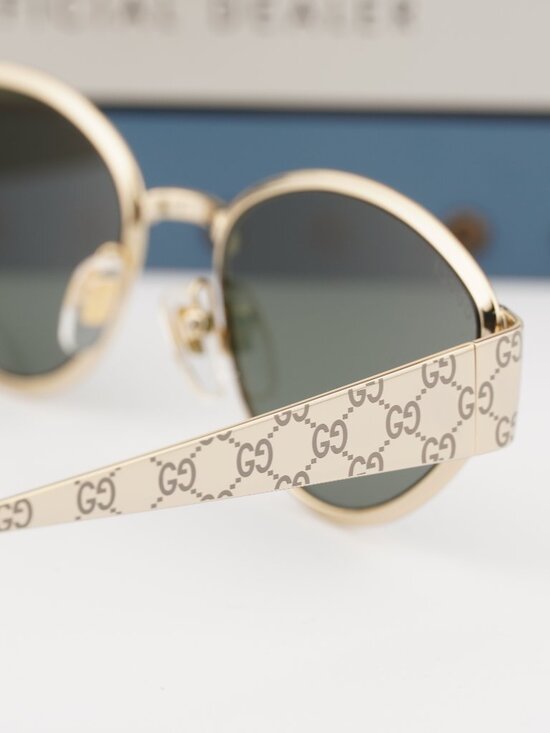 Gucci GG1853S 001 Oval Sunglasses – Gold / Grey main image 10